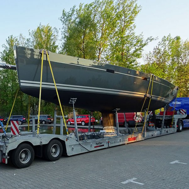 Ready for yacht transport across Europe with tractor unit and trailer from heller Lackiererei GmbH