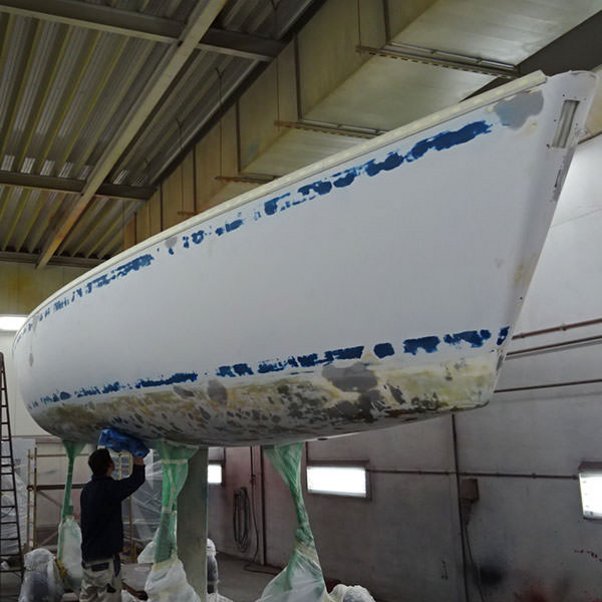Before the yacht was painted, the entire ship had to be sanded and primed